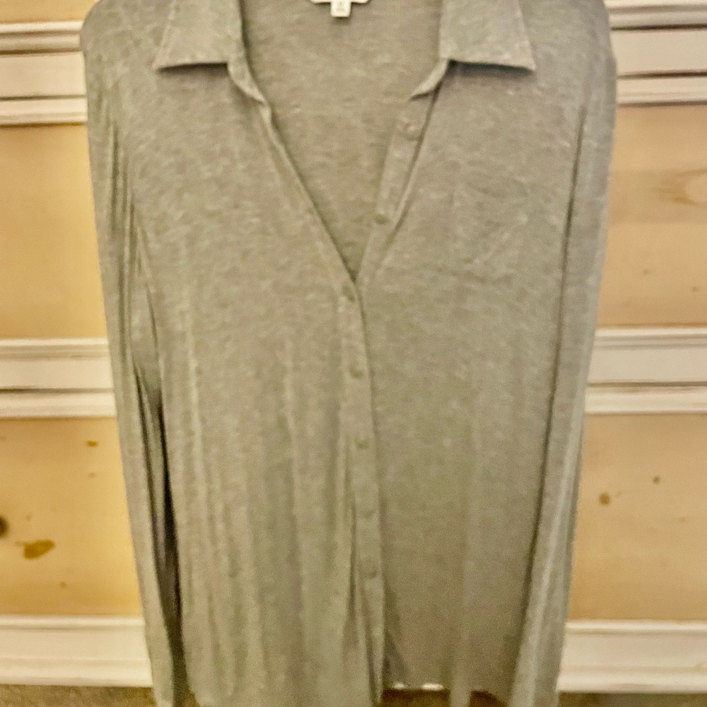 lovely soft and sexy blouse.  accentuates the figure.  plunging neckline